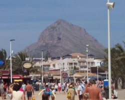 Restaurant strip at the Arenal Beach Javea with Montgo in the background